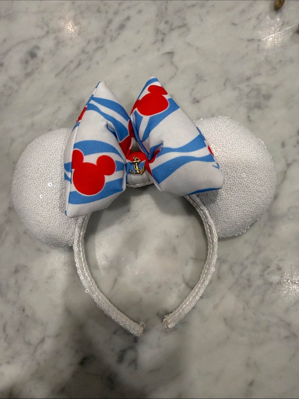 White Sequin Ear Headband with Blue & Red Bow